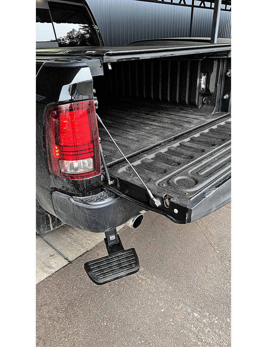 Tylny wysuwany stopień (podwójny wydech) AMP Research - Dodge RAM 1500 09-18
